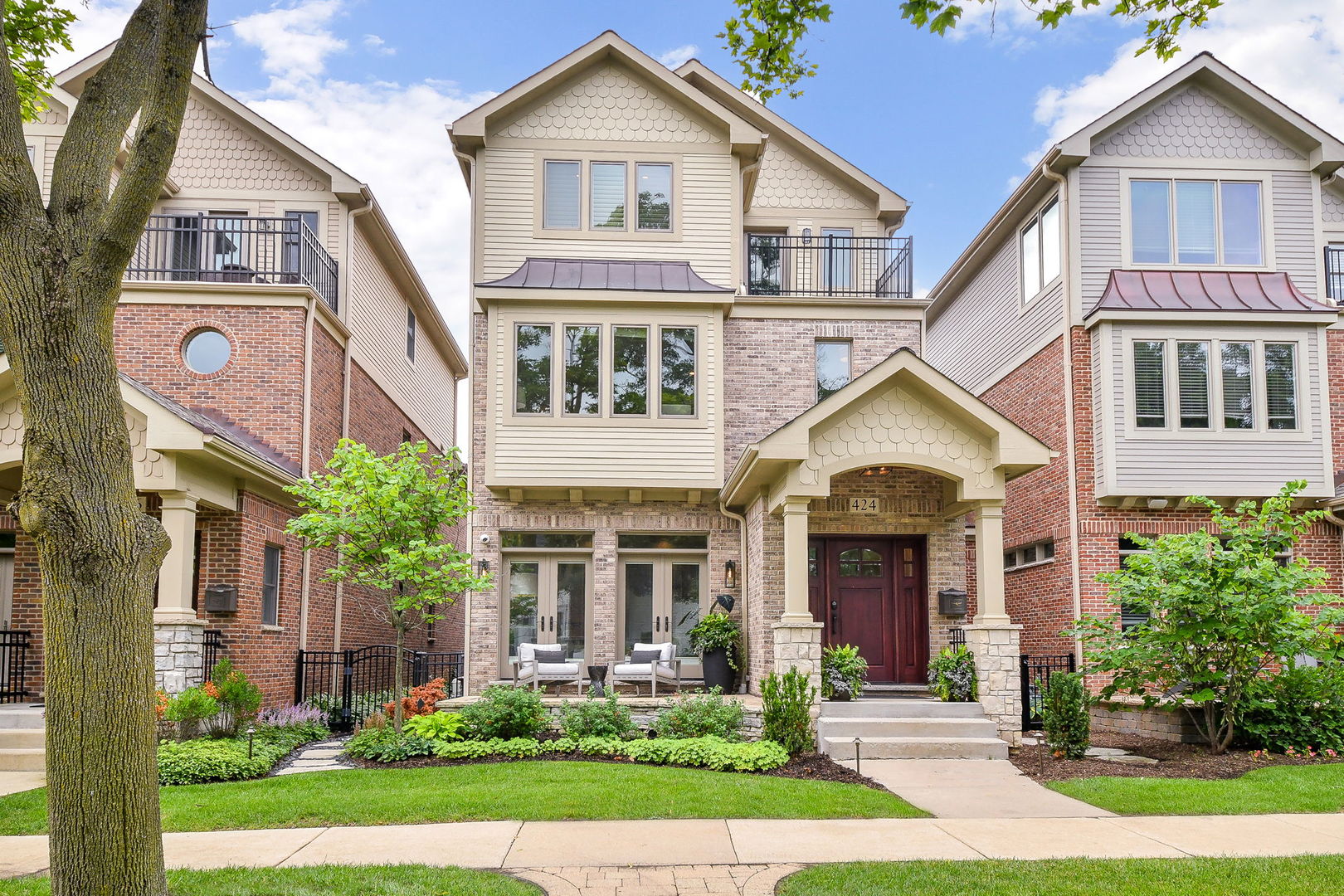 a front view of a house with garden