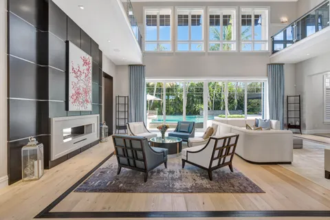 a kitchen with granite countertop a sink stove and cabinets