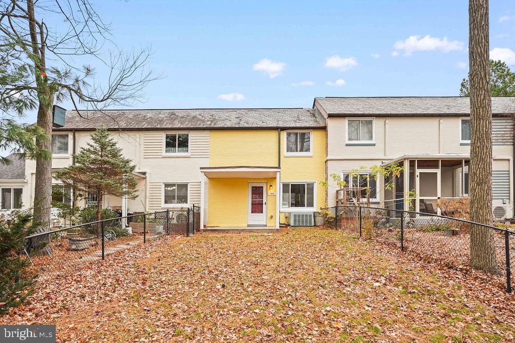 13 Ridge Road Greenbelt, MD 20770 - Photo 18 of 32 a front view of a house with garden