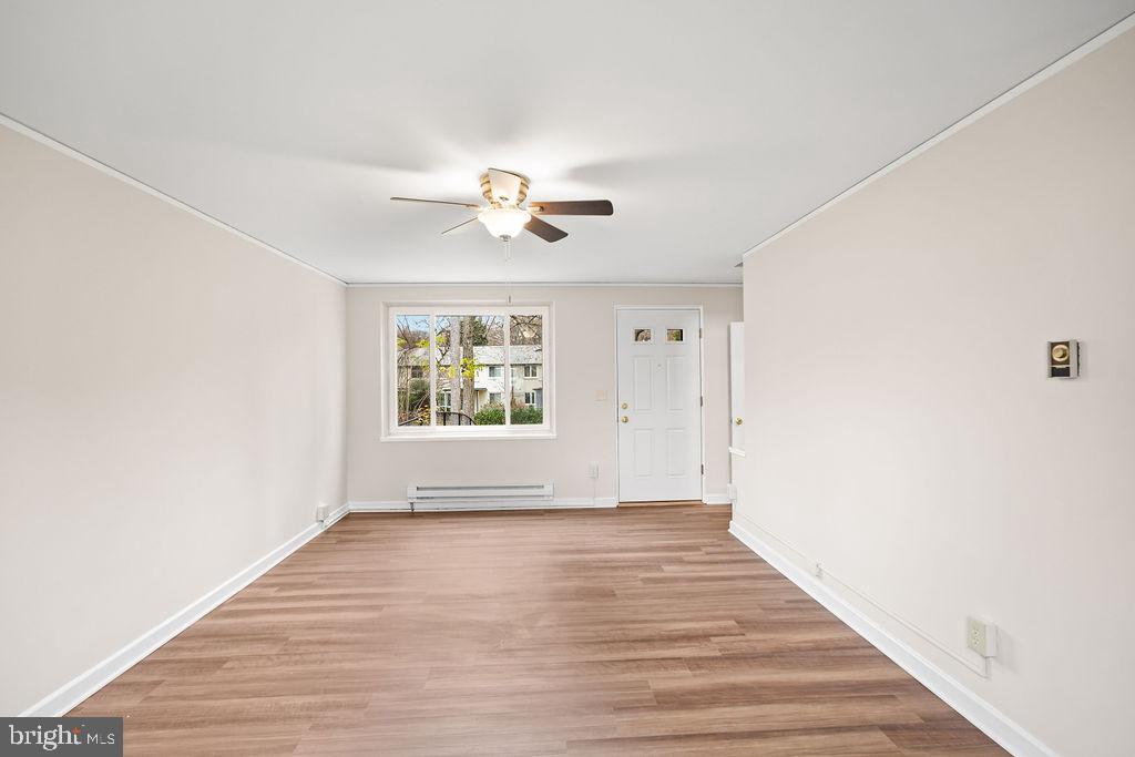 13 Ridge Road Greenbelt, MD 20770 - Photo 24 of 32 a view of an empty room with a window