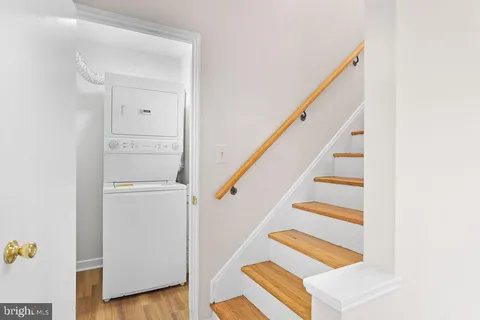 a view of entryway with wooden floor