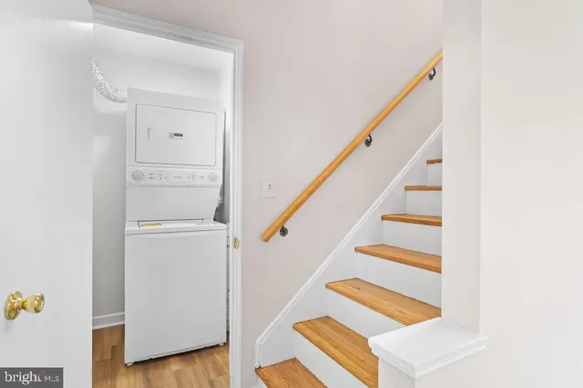 a view of entryway with wooden floor