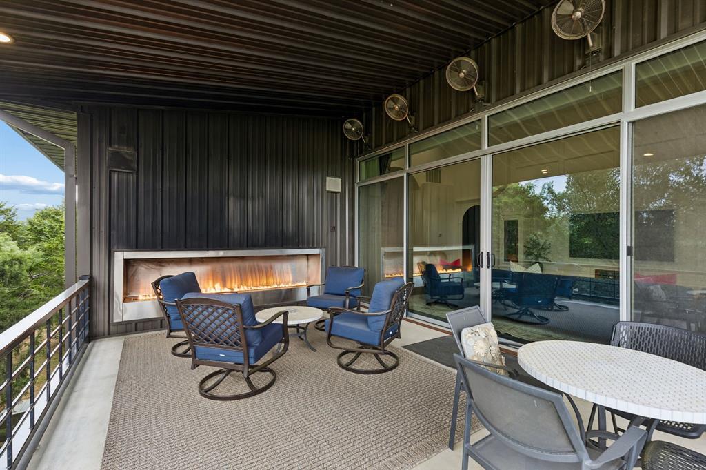 1306 Morrow Road Valley View, TX 76272 - Photo 26 of 40 a view of a chairs and tables in the balcony
