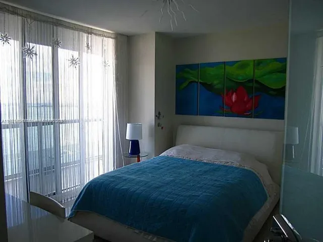 a view of a chairs and tables in the patio