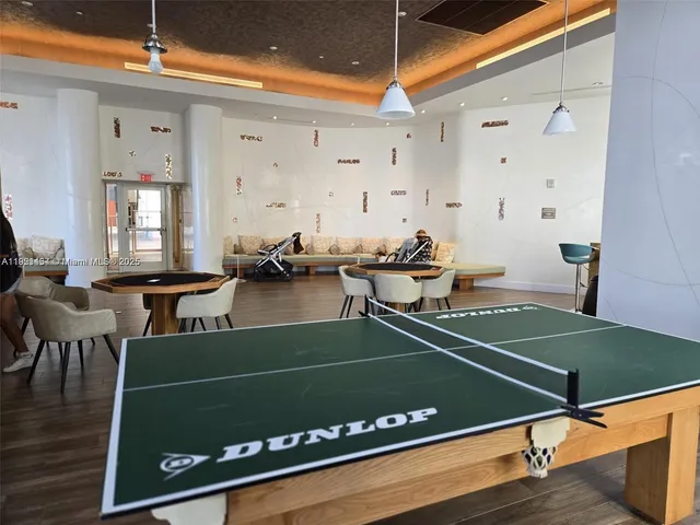 a view of kitchen with furniture and wooden floor