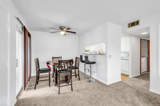 a view of a dining room with furniture
