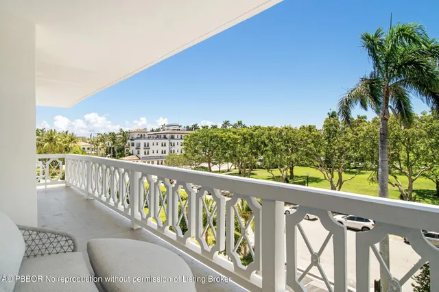 a view of balcony with furniture
