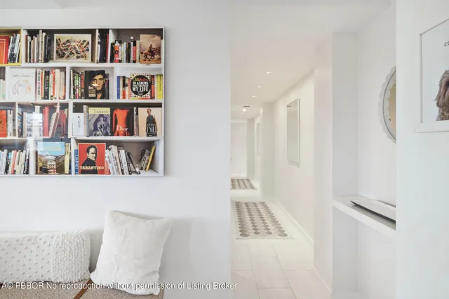 a view of a livingroom with shelves