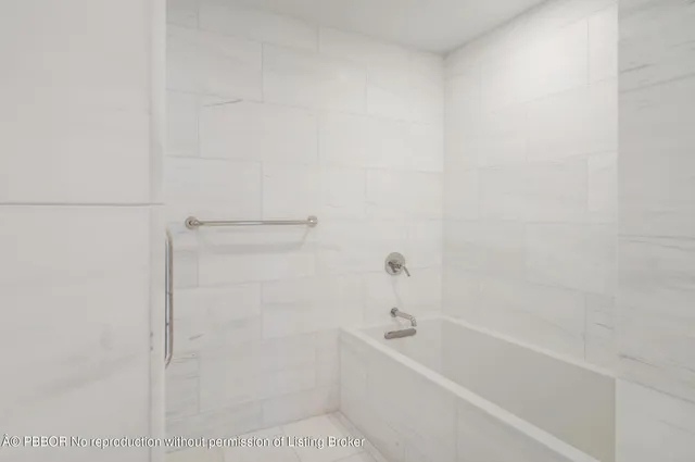 a bathroom with a bathtub