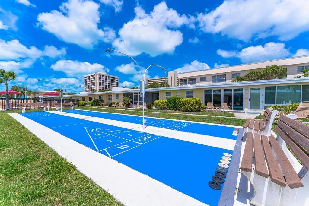 6006 Midnight Pass Road, Unit 29 Sarasota, FL 34242 - Photo 14 of 19 a view of an outdoor space with swimming pool