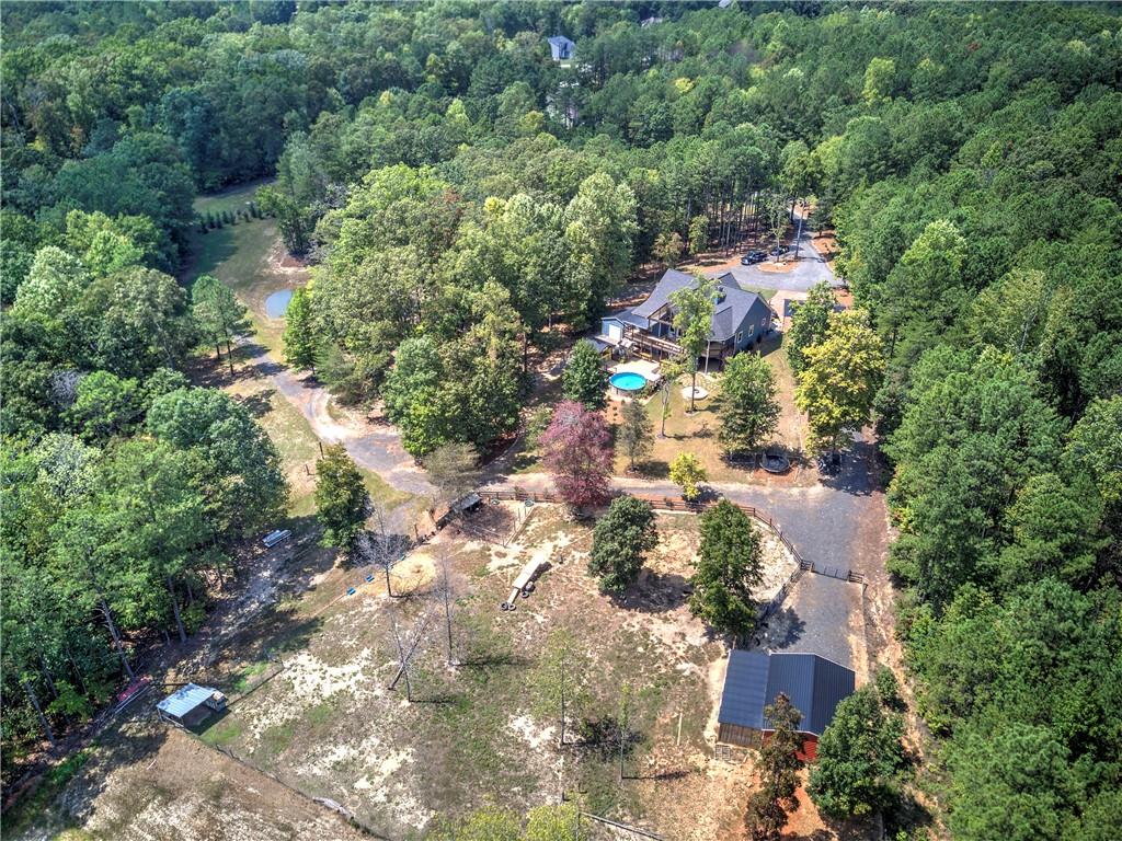 100 Buckwood Farms Path Dallas, GA 30132 - Photo 46 of 70 an aerial view of residential house with outdoor space and trees all around