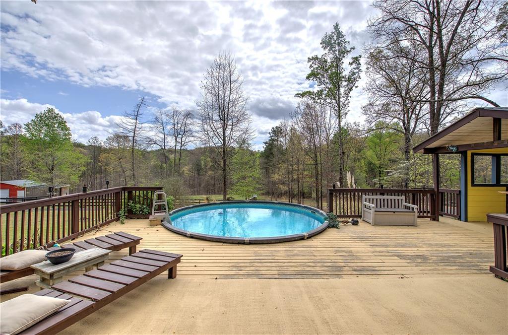 100 Buckwood Farms Path Dallas, GA 30132 - Photo 60 of 70 a view of a swimming pool with a patio