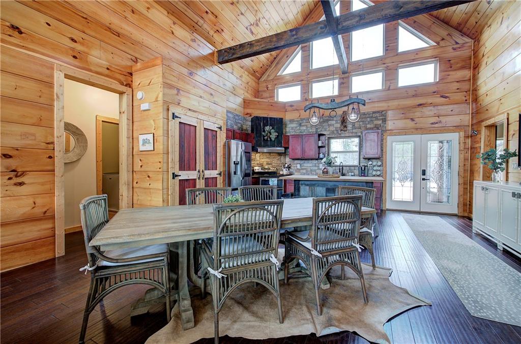 100 Buckwood Farms Path Dallas, GA 30132 - Photo 7 of 70 a kitchen with a table and chairs in it