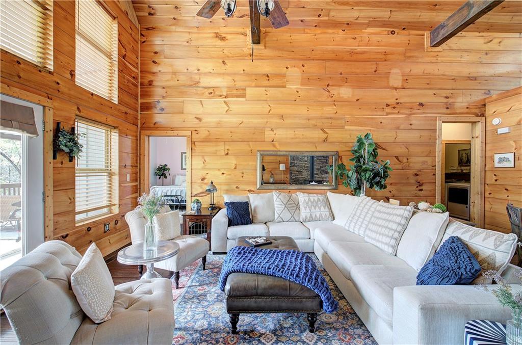 100 Buckwood Farms Path Dallas, GA 30132 - Photo 9 of 70 a living room with furniture and a large window