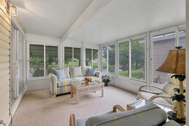 a view of front door with outdoor seating