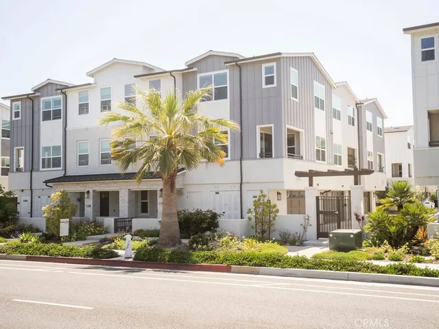 a front view of a multi story residential apartment building