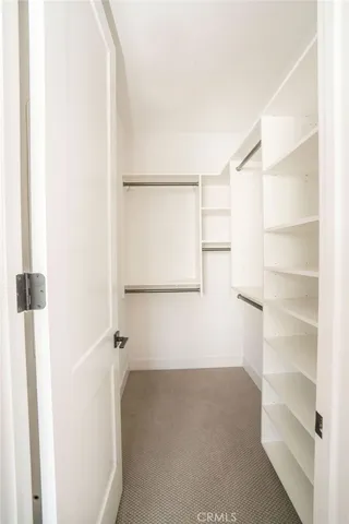 a close view of a utility room with dryer and washer