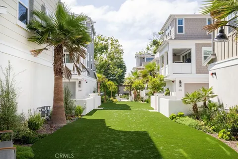 a view of a house with a street