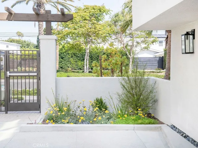 a view of a chairs and table in a patio