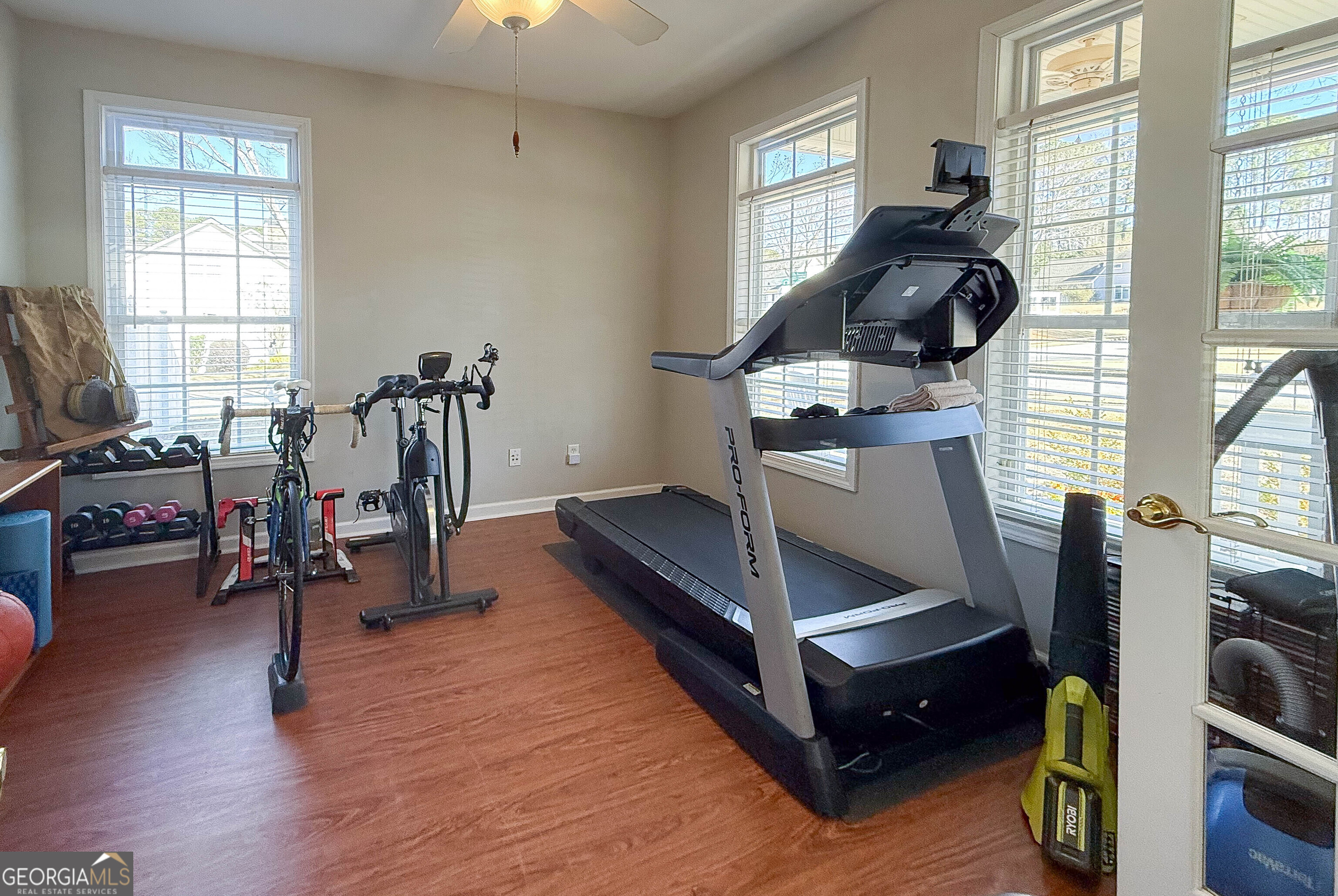 38 The Promenade Newnan, GA 30265 - Photo 12 of 22 a living room with furniture and a wooden floor