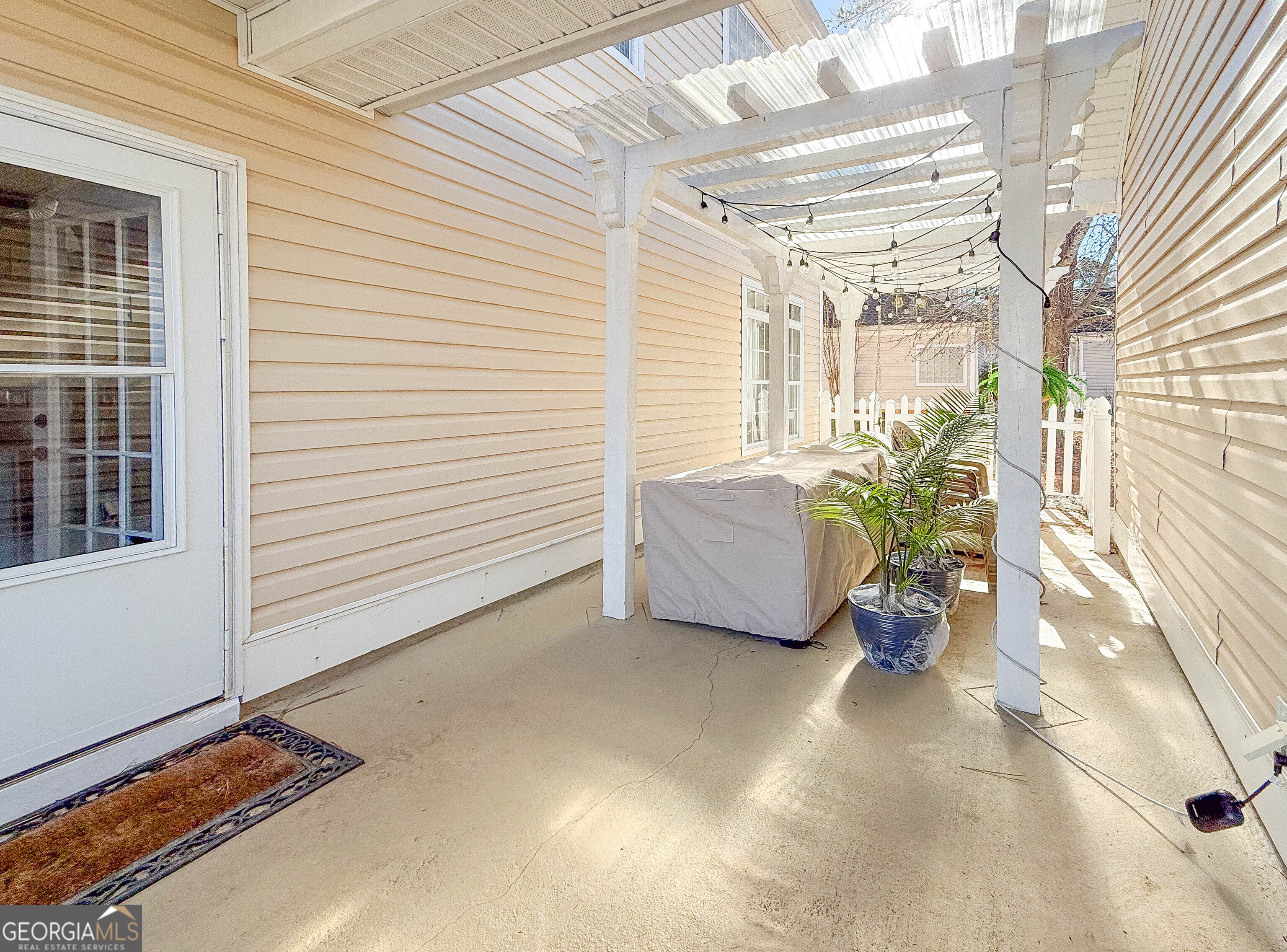 38 The Promenade Newnan, GA 30265 - Photo 15 of 22 a view of a room with furniture and a porch