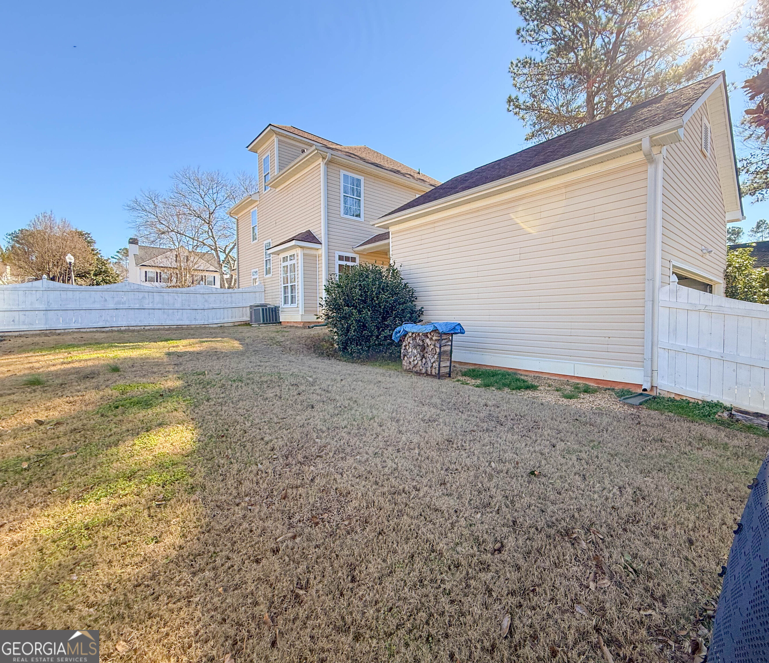 38 The Promenade Newnan, GA 30265 - Photo 17 of 22 a view of a house with backyard and garden