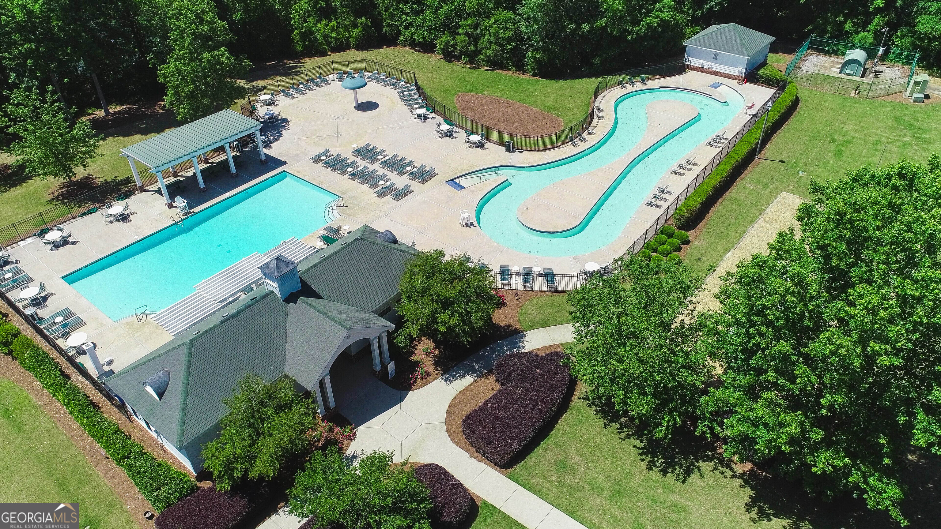 38 The Promenade Newnan, GA 30265 - Photo 20 of 22 an aerial view of a house with a swimming pool