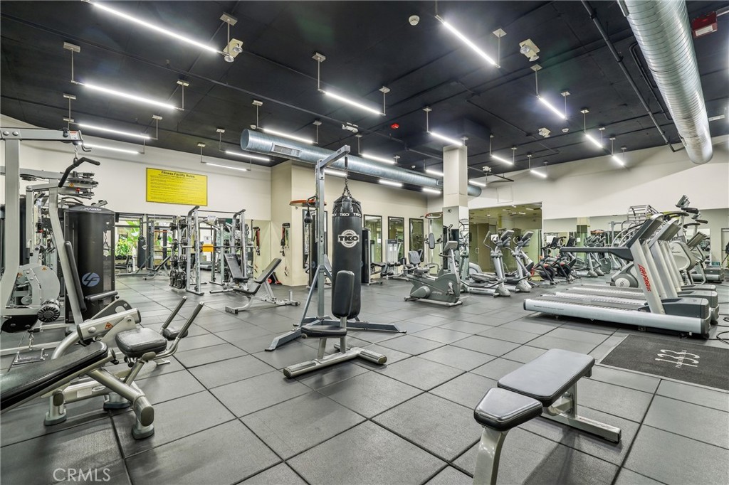 133 The Promenade North, Unit 118 Long Beach, CA 90802 - Photo 31 of 35 a view of a room with gym equipment