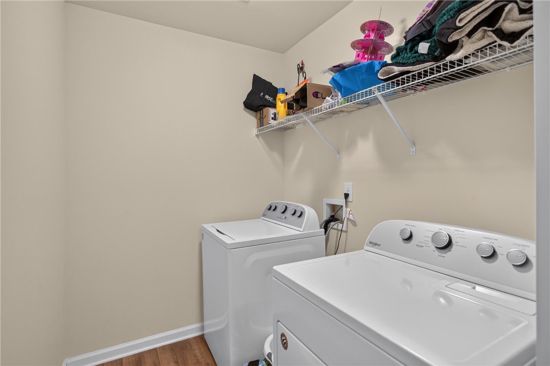 1081 Edenbrooke Circle Anderson, SC 29621 - Photo 38 of 46 Functional utility space with convenient laundry appliances and overhead storage.