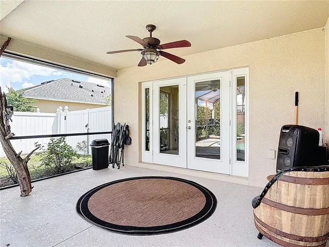 a view of swimming pool with a patio and a yard
