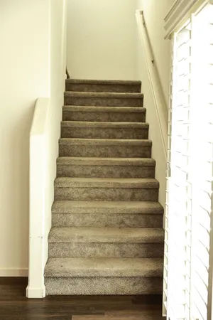 a bathroom with a mirror and a sink