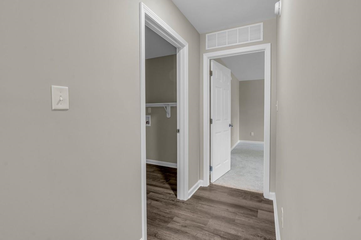 101 Walnut Ridge Ripley, TN 38063 - Photo 11 of 24 a view of a hallway with wooden floor