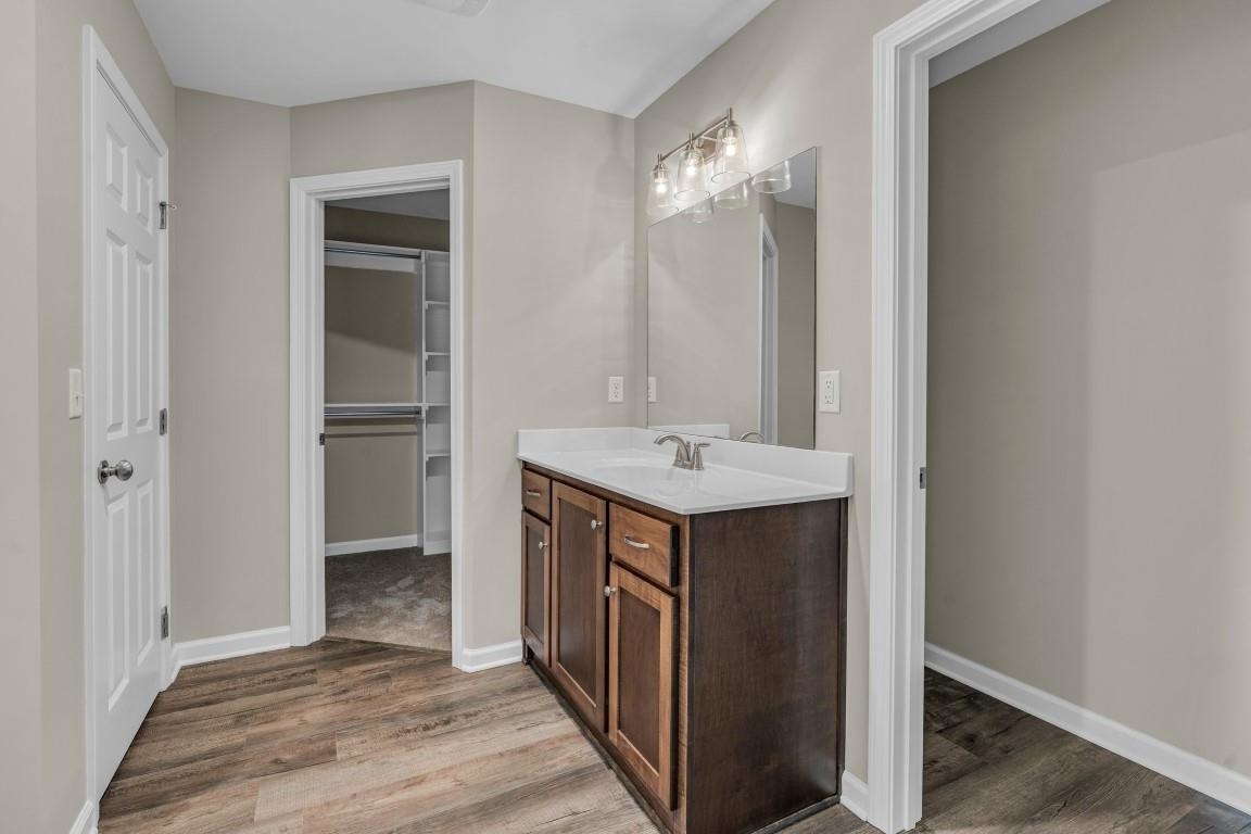 101 Walnut Ridge Ripley, TN 38063 - Photo 6 of 24 a bathroom with sink and mirror