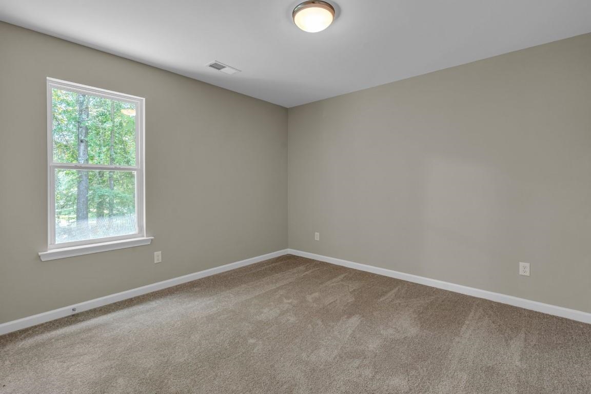 101 Walnut Ridge Ripley, TN 38063 - Photo 9 of 24 an empty room with a window
