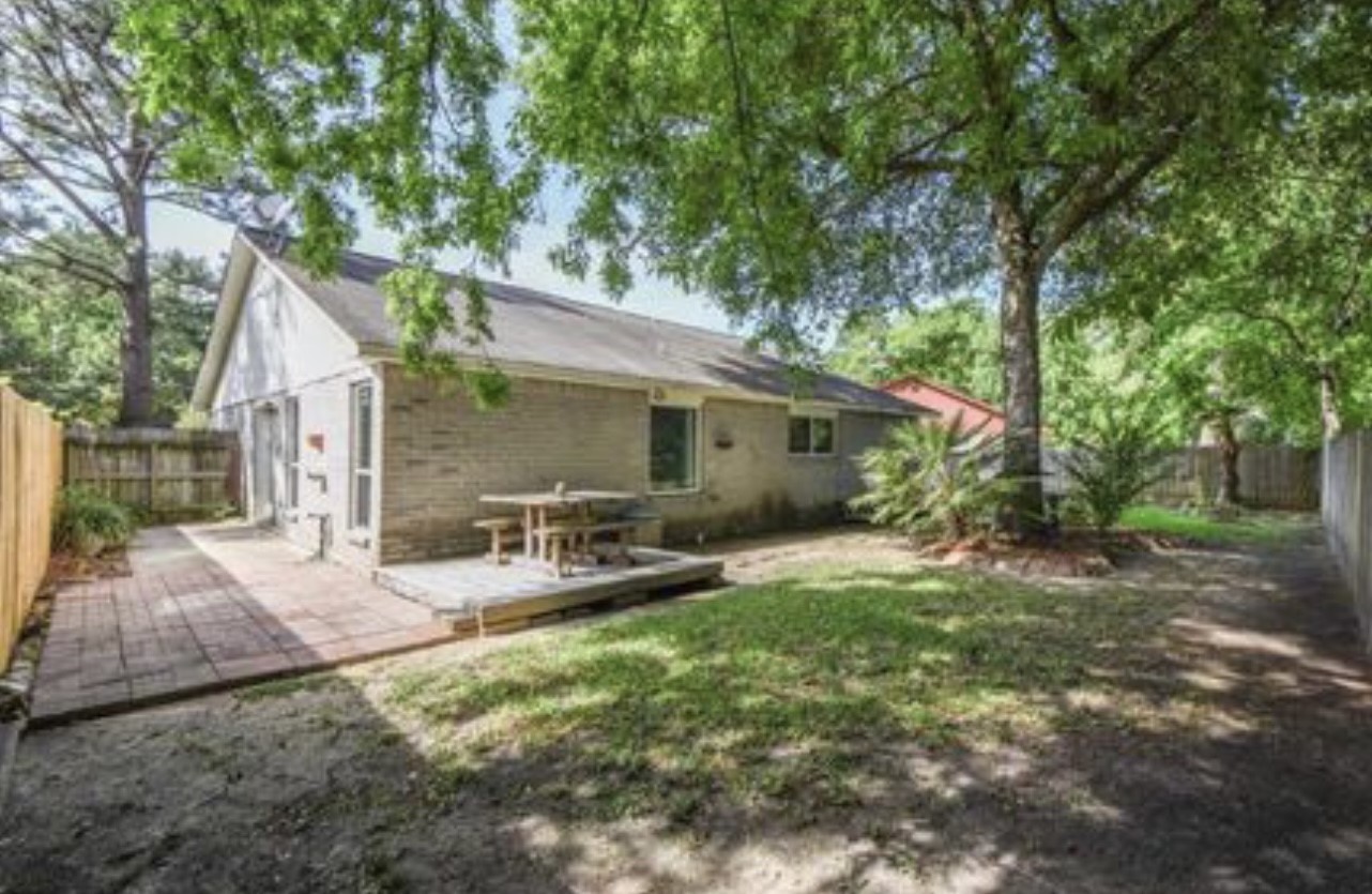 5906 Flower Gate Drive Spring, TX 77373 - Photo 6 of 7 a view of a house with backyard and sitting area