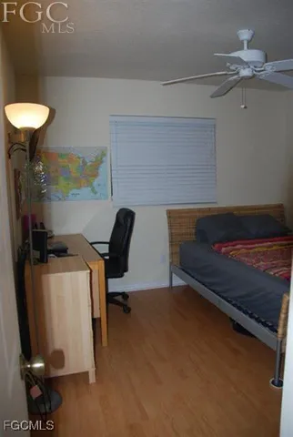 a reading room with furniture and a air conditioner vent