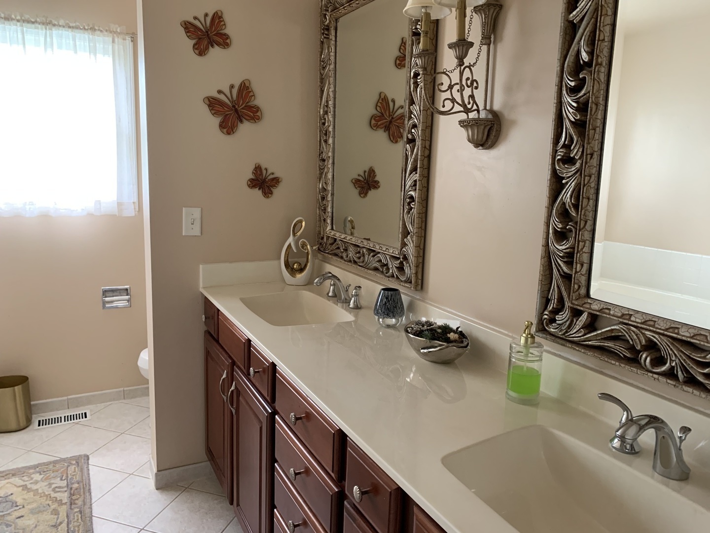 1003 Pember Circle West Dundee, IL 60118 - Photo 12 of 29 a bathroom with a sink and a mirror