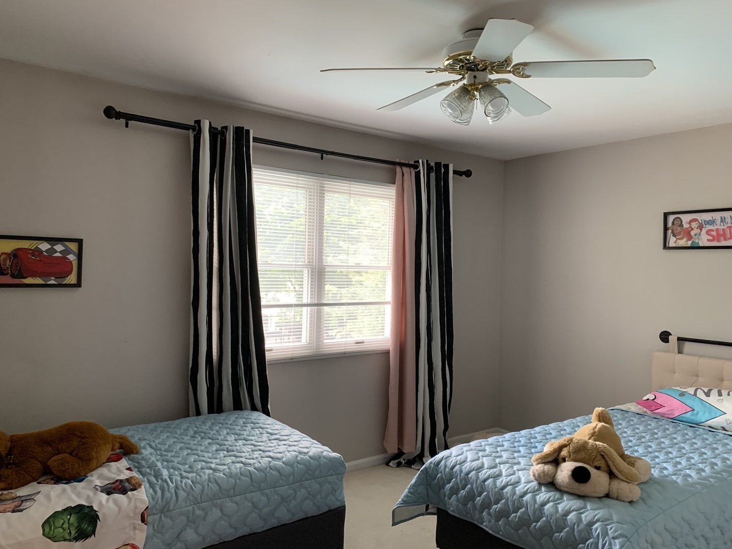 1003 Pember Circle West Dundee, IL 60118 - Photo 16 of 29 a bedroom with a bed and a chandelier