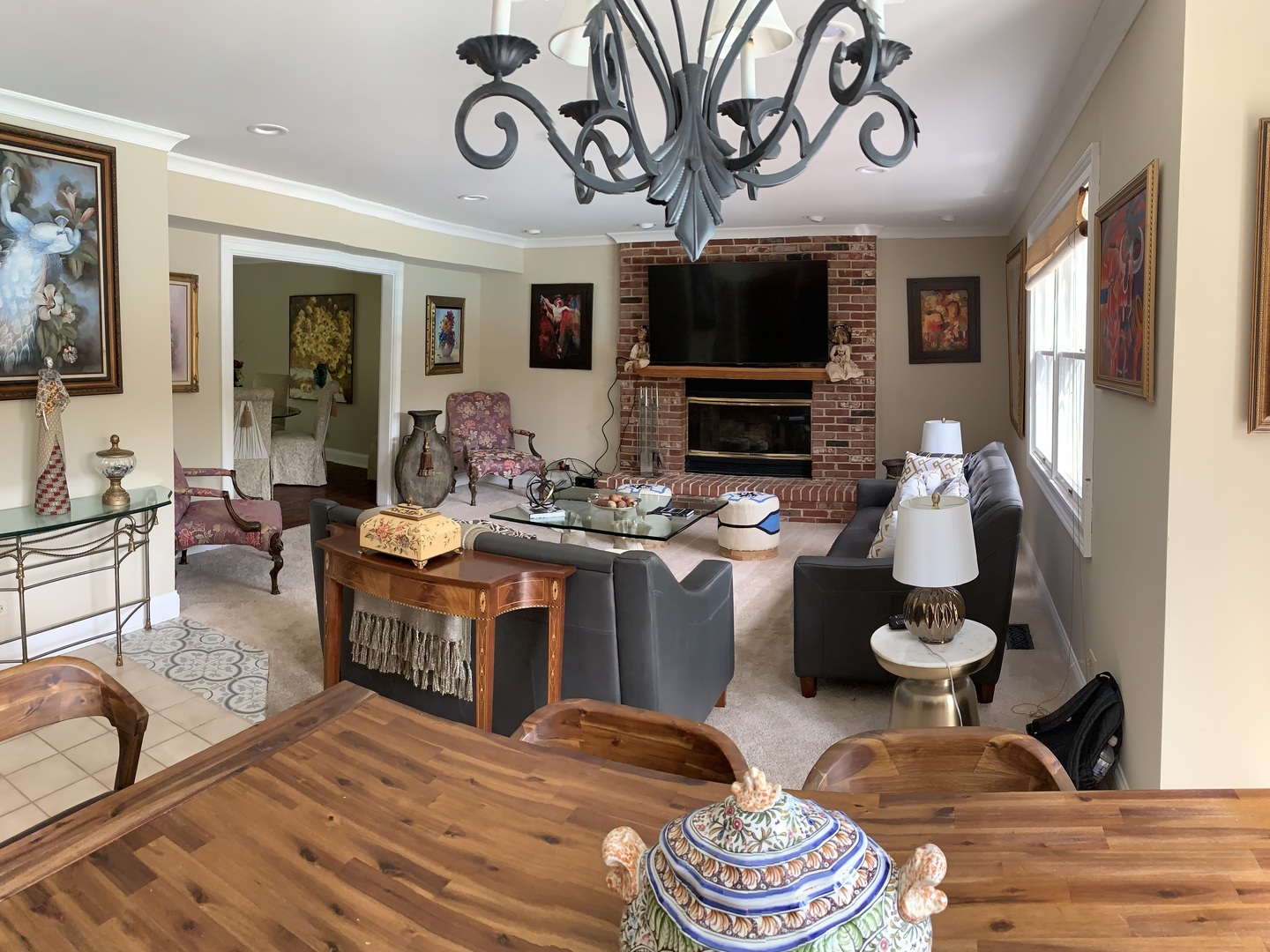 1003 Pember Circle West Dundee, IL 60118 - Photo 27 of 29 a living room with fireplace furniture and a flat screen tv