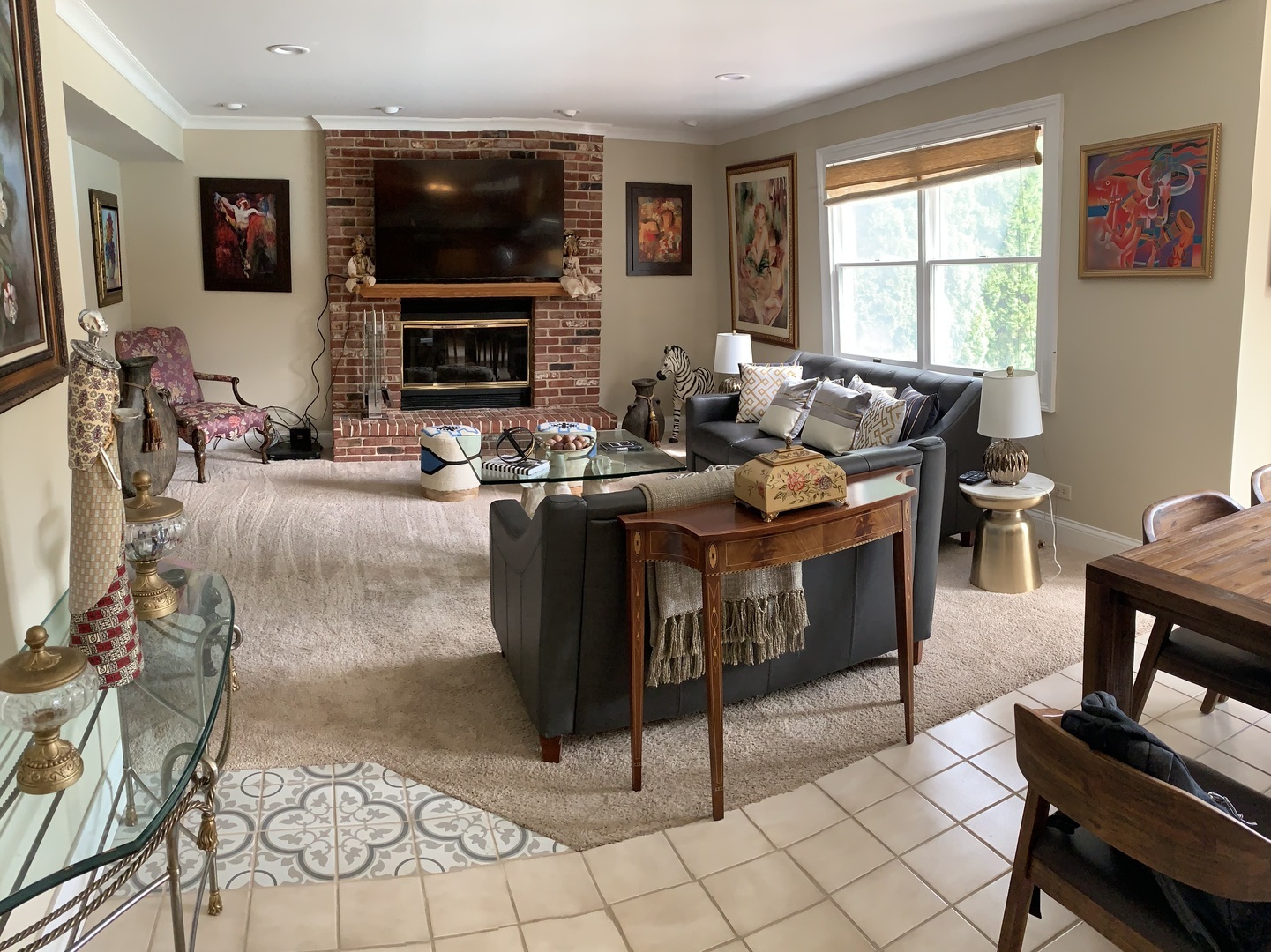 1003 Pember Circle West Dundee, IL 60118 - Photo 28 of 29 a living room with furniture a flat screen tv and a fireplace