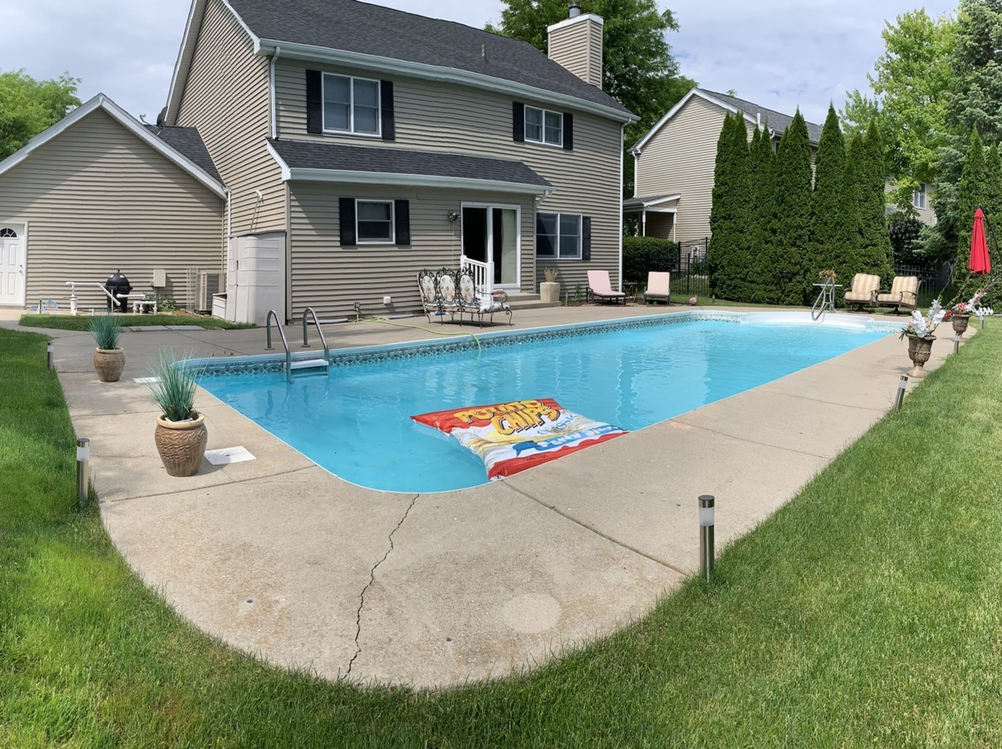 1003 Pember Circle West Dundee, IL 60118 - Photo 3 of 29 a view of a house with swimming pool