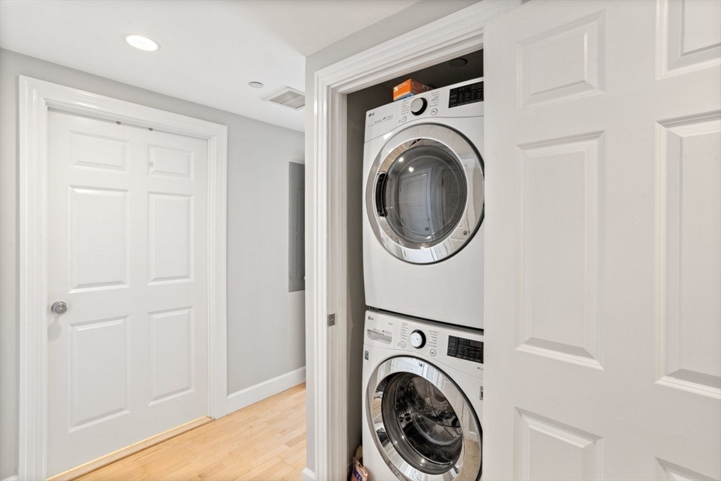 10 Bowdoin Street, Unit 514 Boston, MA 02114 - Photo 9 of 11 a utility room with dryer and washer