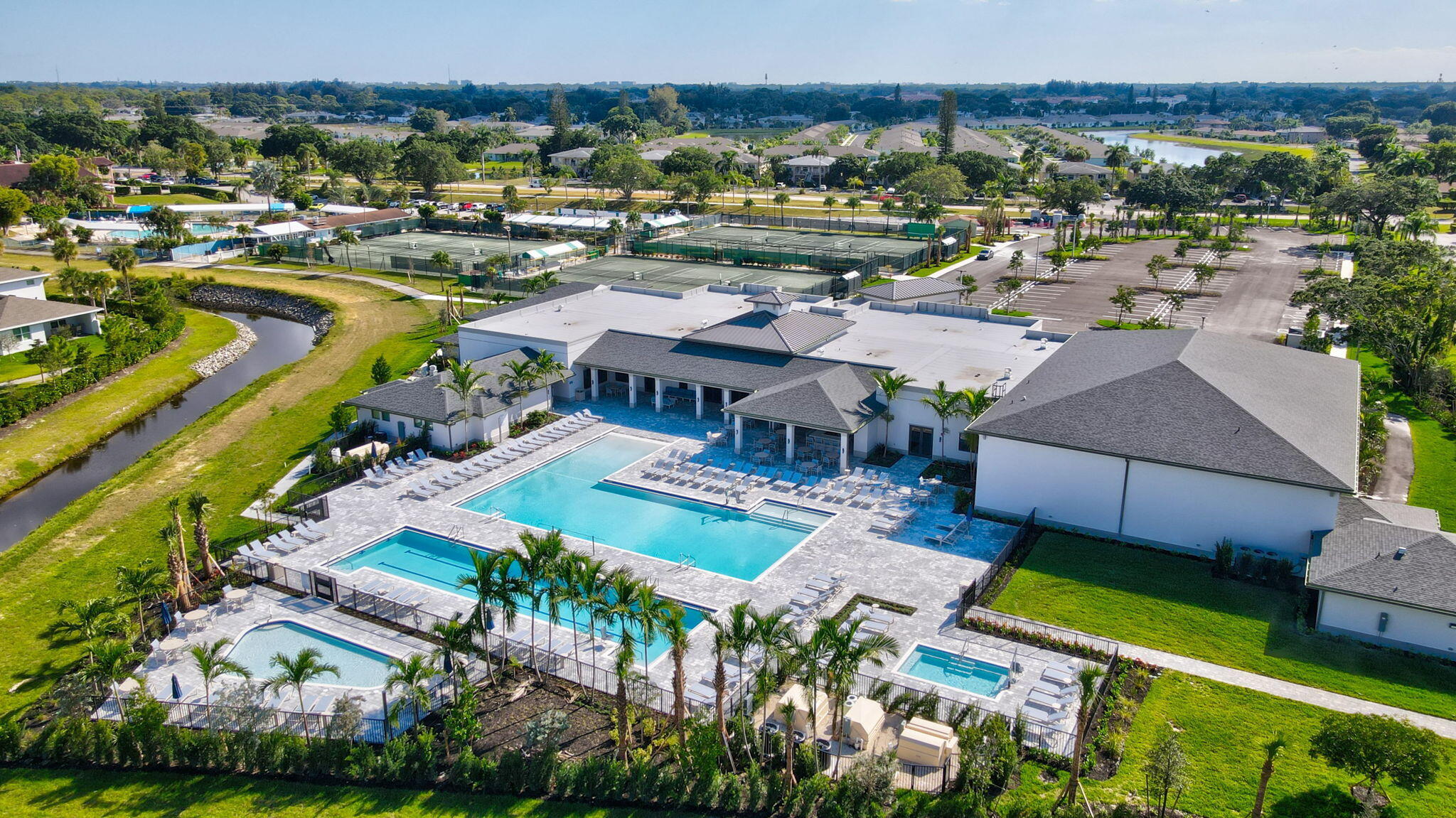 13404 Brotherhood Way Delray Beach, FL 33484 - Photo 38 of 44 a view of a lake with a house