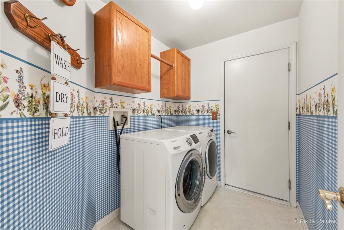 210 Ellis Road Lake In The Hills, IL 60156 - Photo 32 of 57 a utility room with dryer and washer