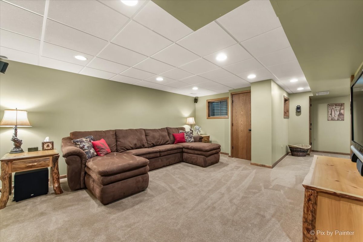 210 Ellis Road Lake In The Hills, IL 60156 - Photo 36 of 57 a living room with furniture and a couch