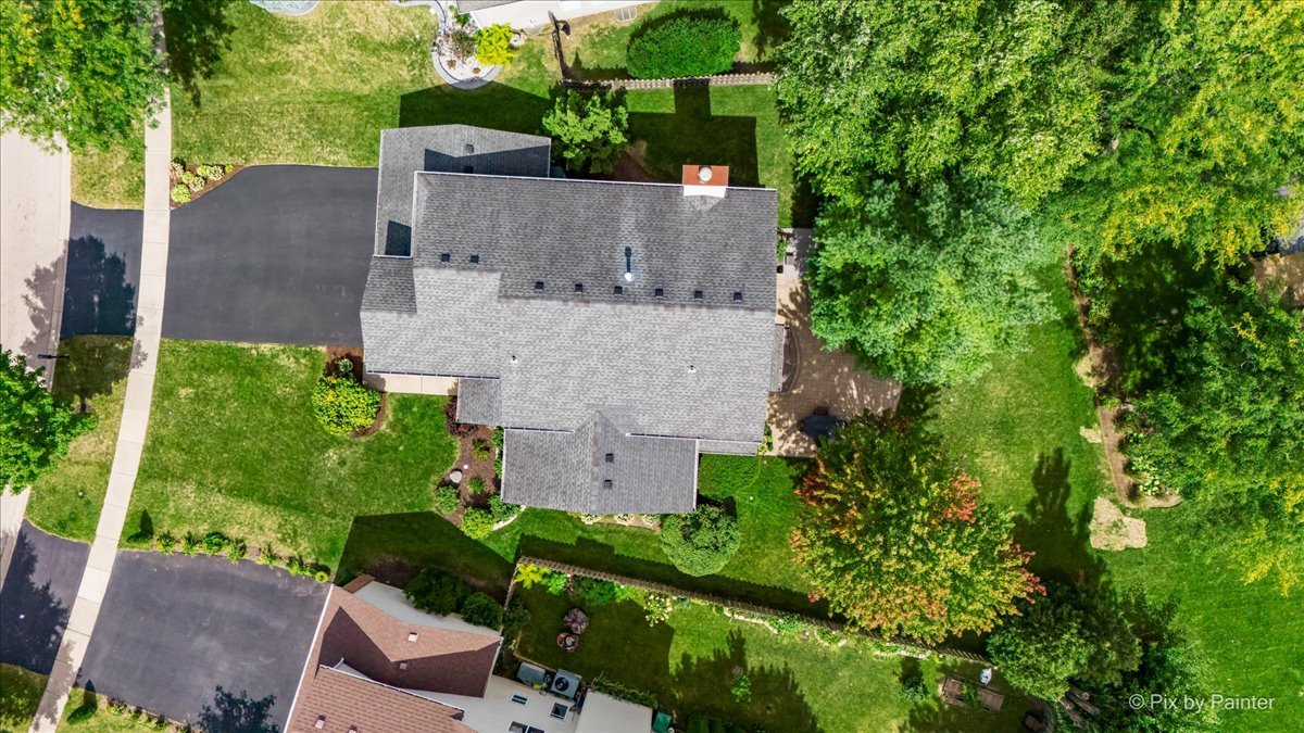 210 Ellis Road Lake In The Hills, IL 60156 - Photo 48 of 57 an aerial view of a house with a yard