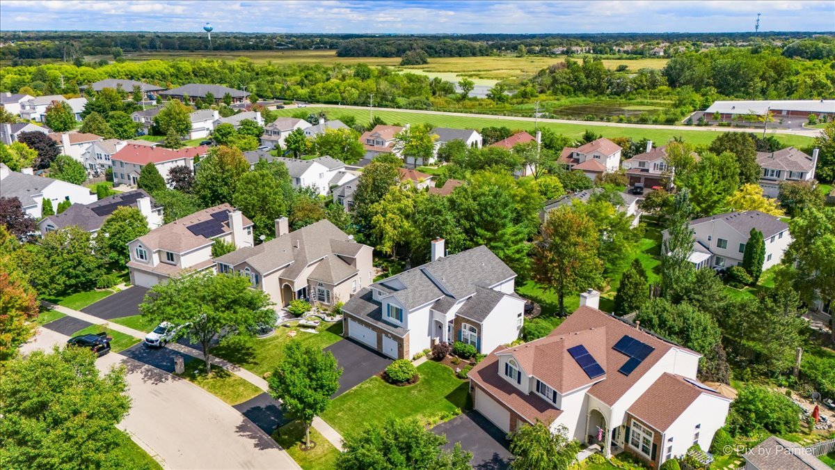210 Ellis Road Lake In The Hills, IL 60156 - Photo 49 of 57 an aerial view of residential houses with outdoor space and street view