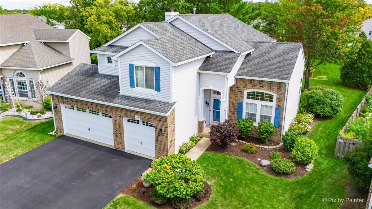210 Ellis Road Lake In The Hills, IL 60156 - Photo 50 of 57 a aerial view of a house next to a yard