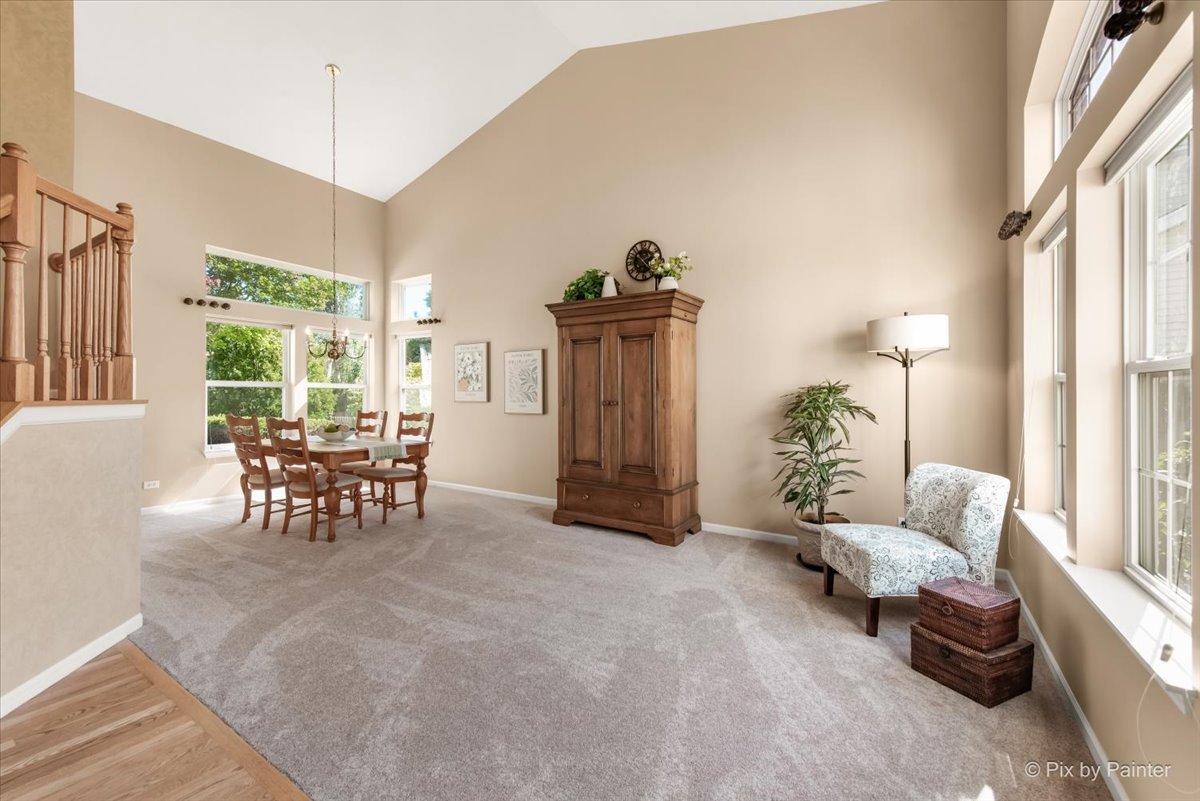 210 Ellis Road Lake In The Hills, IL 60156 - Photo 7 of 57 a living room with furniture and wooden floor