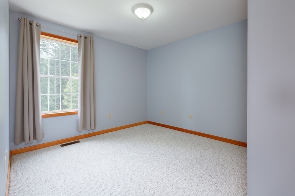 8 Ames Road Brookline, NH 03033 - Photo 16 of 26 an empty room with a window